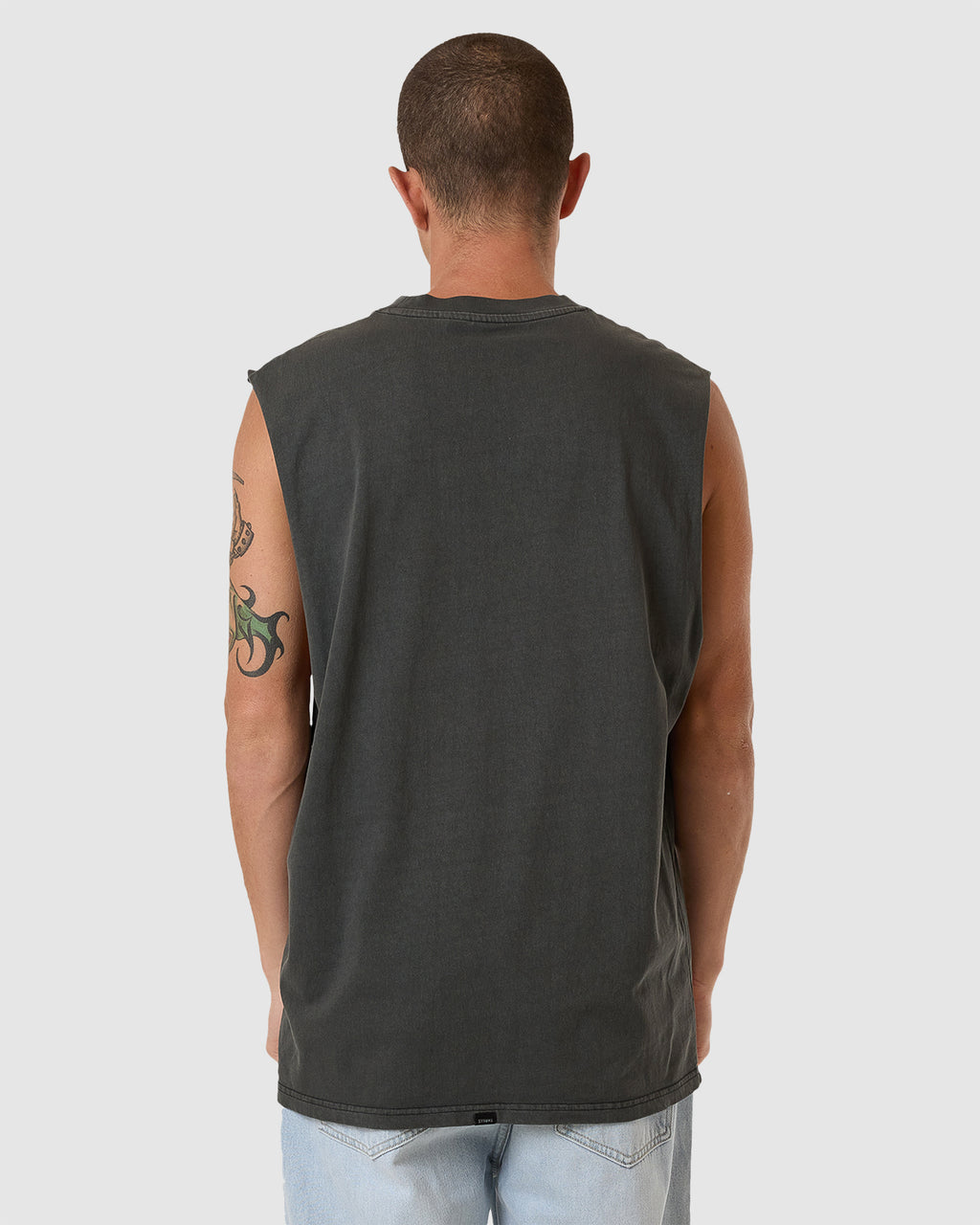 MENS NEVER STOP MERCH FIT TANK TOP